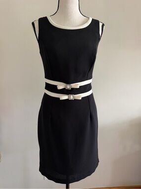 Sleeveless Black Midi Dress with White Trim and Dual Bow Belts